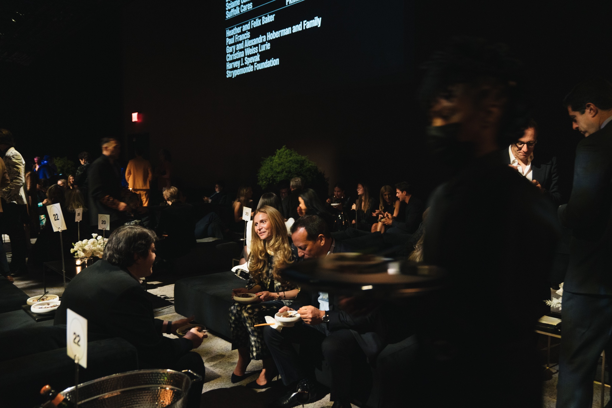 Guests eat dinner seated in dedicated lounges with low couches and chairs.