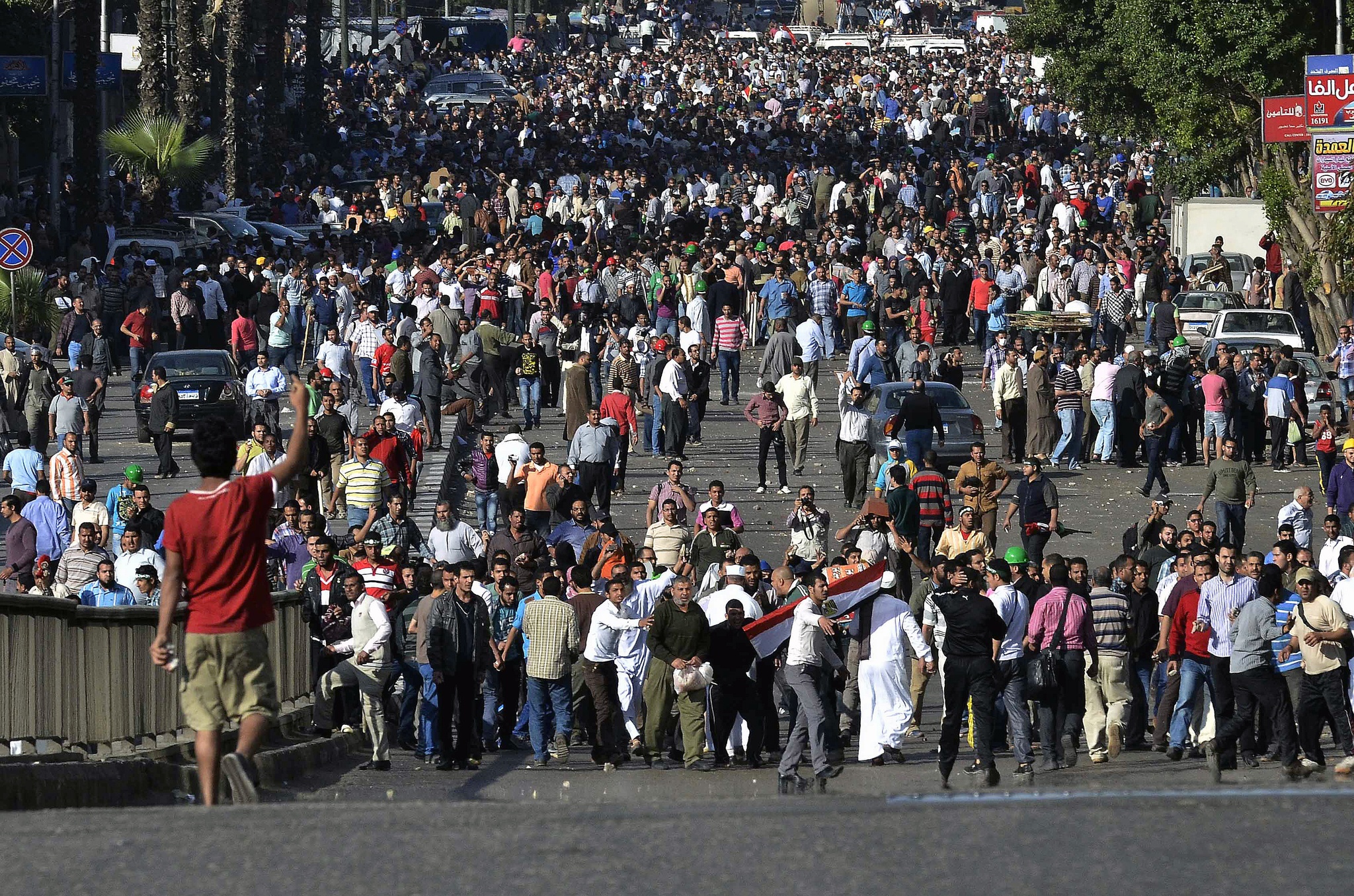 A crowd of protesters in a city street